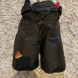 CANUCKS FLYING SKATE HP45 HOCKEY PANTS LARGE -1