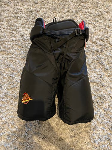 CANUCKS FLYING SKATE HP45 HOCKEY PANTS LARGE -1