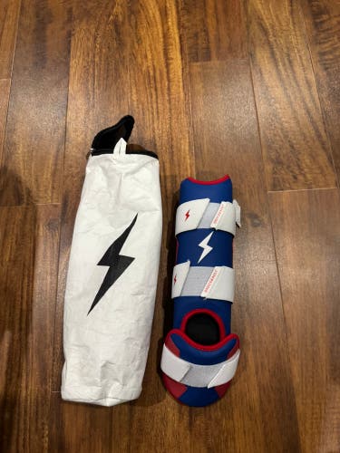 Red/white/ blue Bruce bolt leg guard adult  (New)