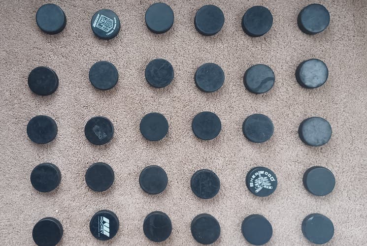 30 good hockey pucks