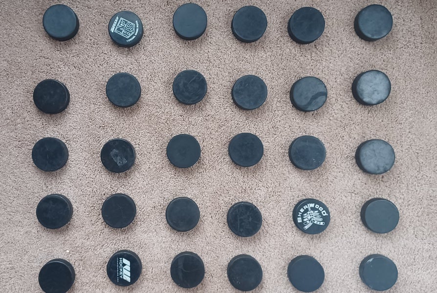 30 good hockey pucks