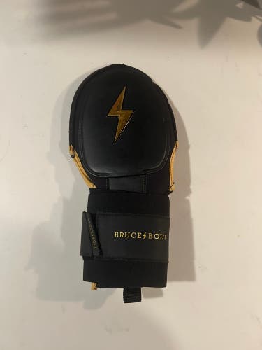 Bruce Bolt Black & Gold Adult Sliding Mitt