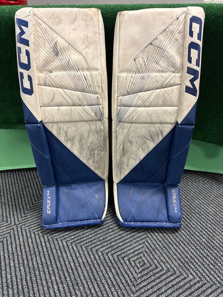 White & Blue Intermediate CCM Eflex 6.9 Goalie Leg Pads (Used) | 32"+1"