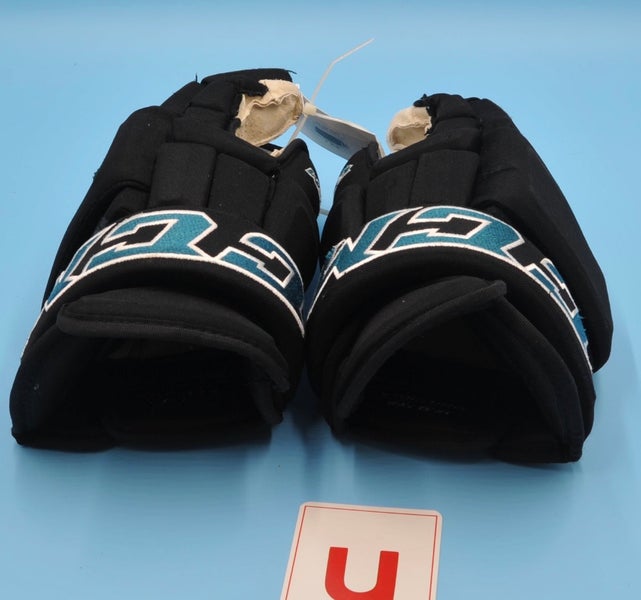 Game Worn San Jose Sharks 14” CCM HG97 Gloves - #81 (Krystof Hrabik)