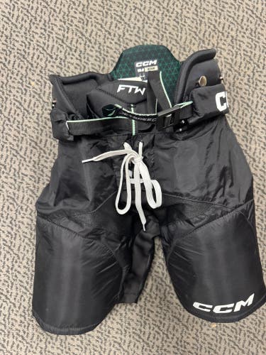 USED ONCE Junior Medium CCM FTW Women’s Hockey Pants (Used)