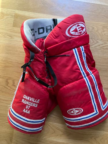 Bundle: Junior Medium Easton Hockey Pants (Used) & Junior XL Hockey Pants