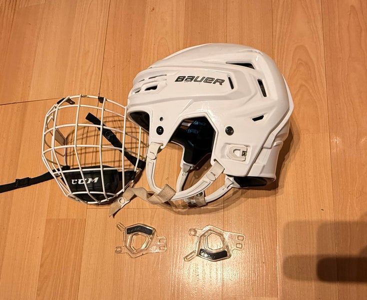 Bauer Re-Akt 150 Helmet with face cage and ear plugs