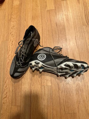 Black Unisex Size M 12.0 (W 13.0) Adult Warrior Burn 7.0 Mid Top Molded Cleats (Used)