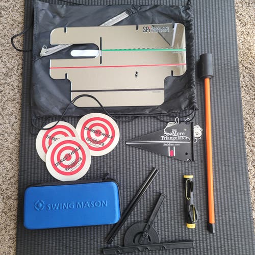 Putting mirror, grip trainer, adjustable swing plane, rotation stick, and putting targets