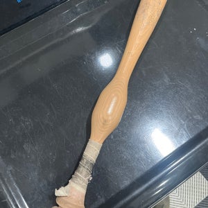 Brown (Used) camwood one hand trainer.