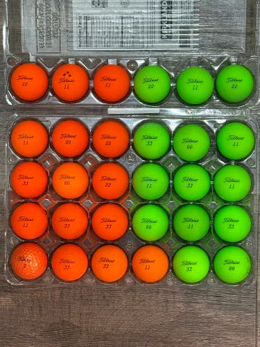 30 Titleist Velocity Golf Balls - Matte Green and Orange