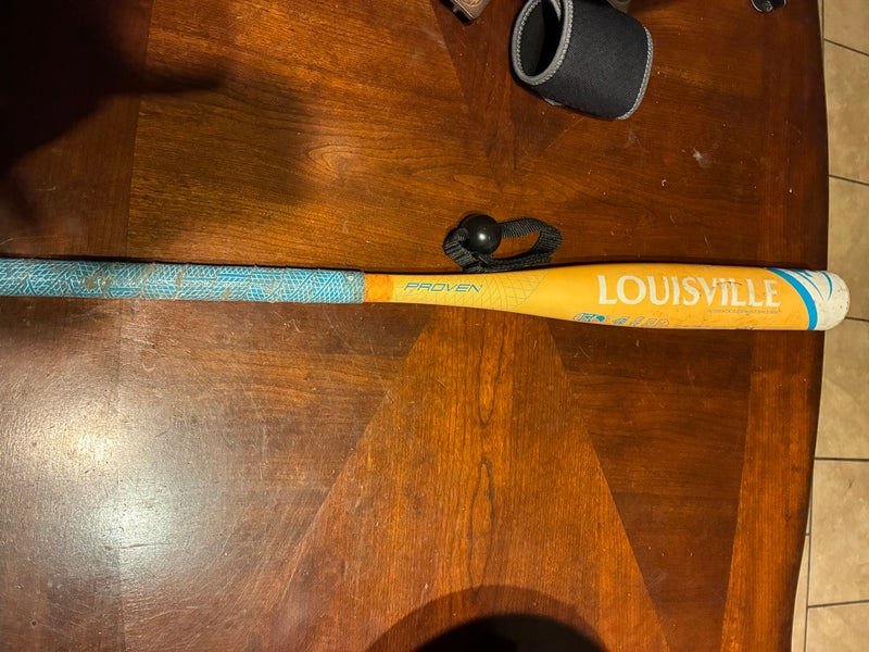 Used Louisville Slugger Proven Official Softball Bat