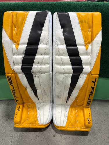 White Black & Yellow Intermediate True Catalyst 7X3 Goalie Leg Pads (Used) | 30"+2"