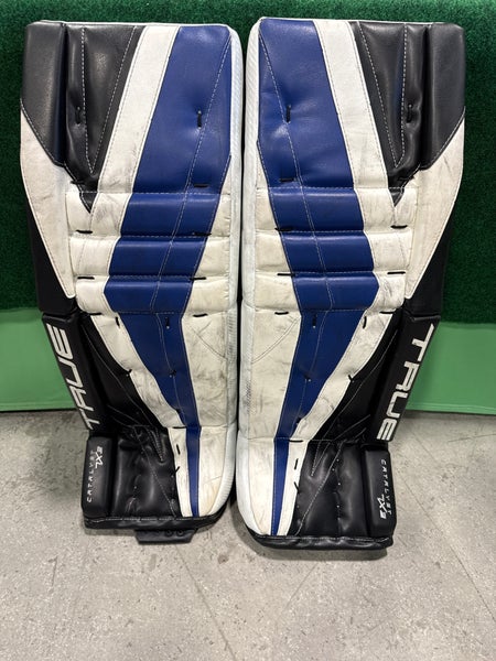 White Black & Blue Intermediate True Catalyst 7X3 Goalie Leg Pads (Used) | 31"+2"