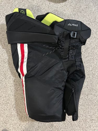 Senior Medium Warrior Alpha PRO Hockey Pants Pro Stock Indy Fuel / Blackhawks (New)