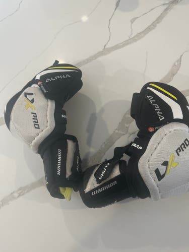 Junior Medium Warrior Alpha LX Pro Elbow Pads (Used)