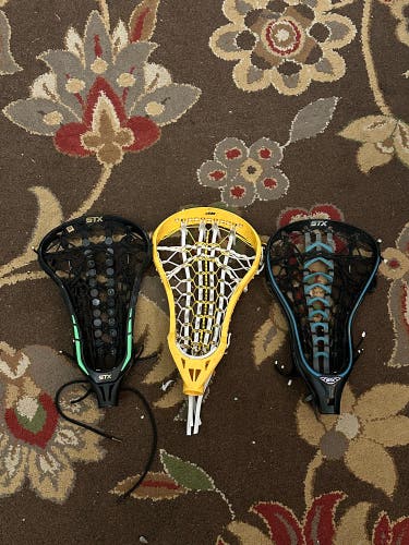 Three Women’s Strung Heads