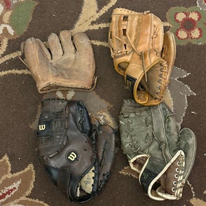 Four Used Right Handed Baseball Gloves