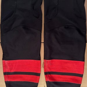 Used Carolina Hurricanes Black/Red Alternate Pro Stock Fanatics Hockey Socks Size XL