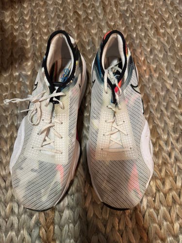 Men’s white Nike running shoes.