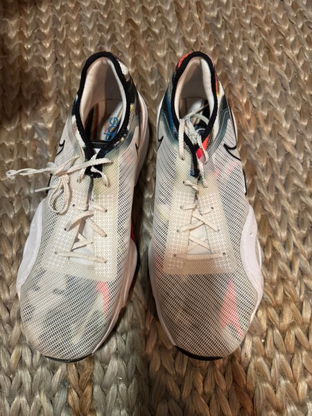 Men’s white Nike running shoes.