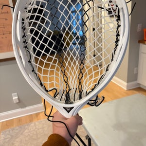 ECD Impact Strung Head (Used) Brand new Impact mesh, and brand new ball stop.