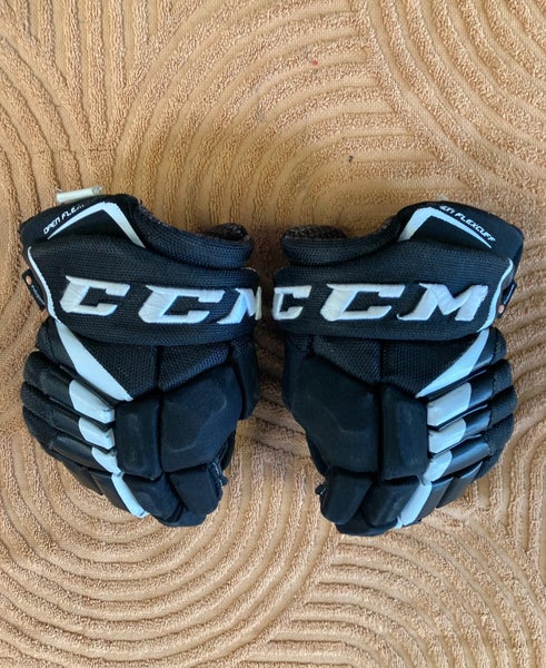 Black Junior CCM JetSpeed FT4 Pro Gloves 11" (Used)
