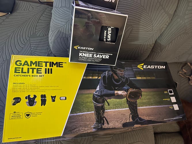 New in box Easton elite 3 adult chest protector and leg guards w/New Knee Savers (no helmet)