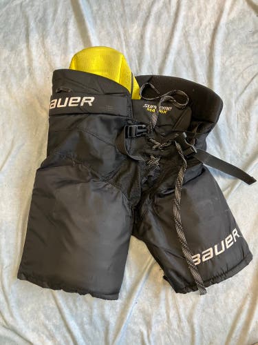 Black Junior Medium Bauer Supreme Matrix Hockey Pants (Used)