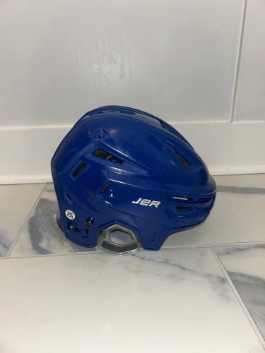 Medium royal blue Bauer Re-Akt 150 Helmet (Used)