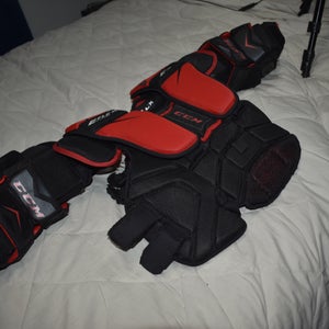 CCM Extreme Flex E1.5 Goalie Chest Protector, Black/Red, OSFA Youth