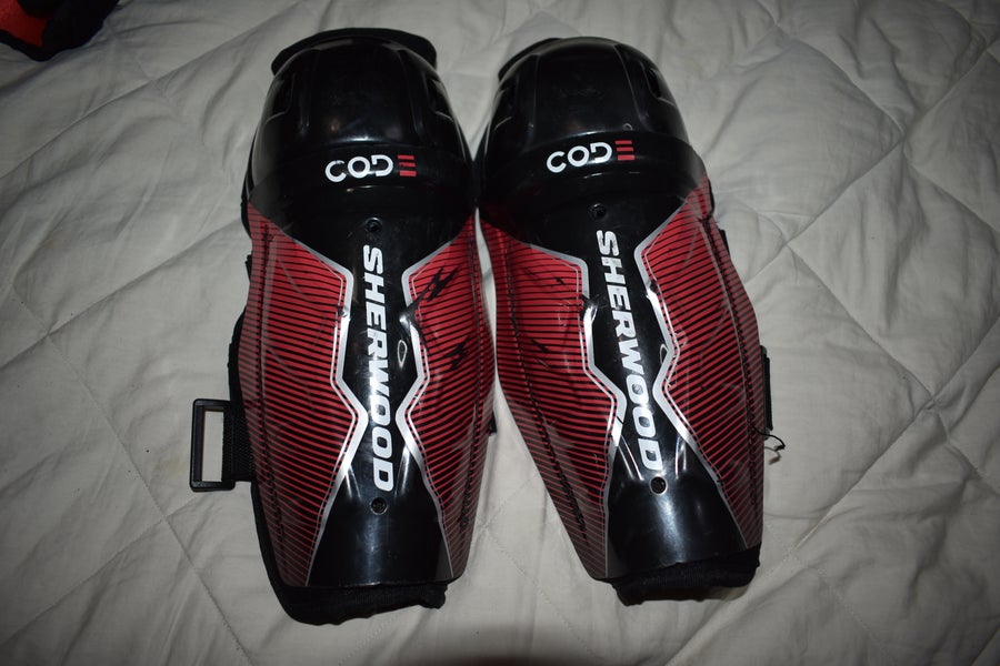 SherWood Code Hockey Shin Pads, Black/Red, Youth 10 Inches