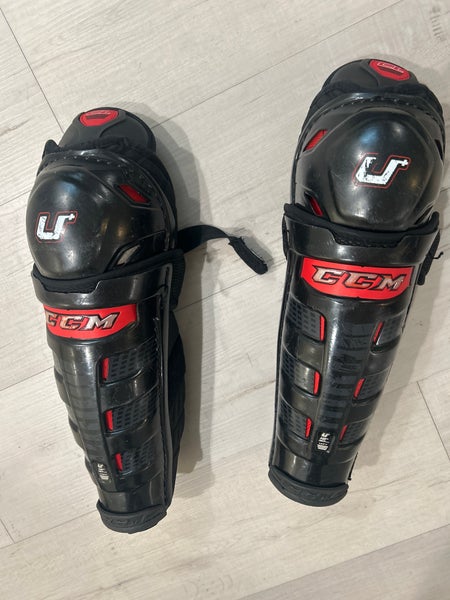 Junior CCM U+ Crazy Light 12" Shin Pads (Used)