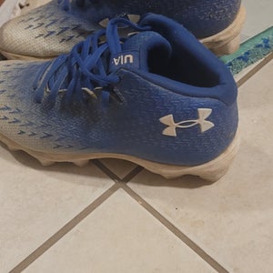 Blue and White under Armour baseball cleates