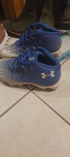 Blue and White under Armour baseball cleates