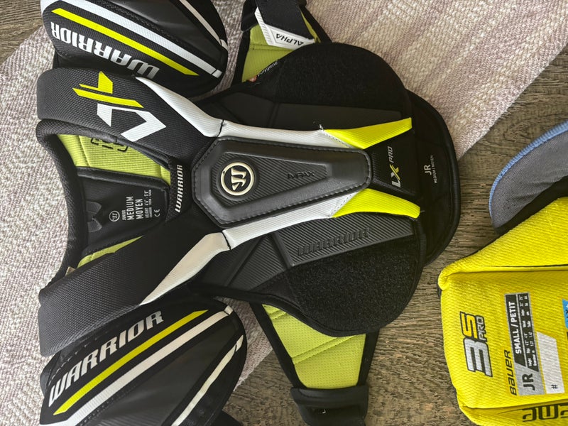 Junior Medium Intermediate Warrior ALPHA LX PRO Shoulder Pads (Used)