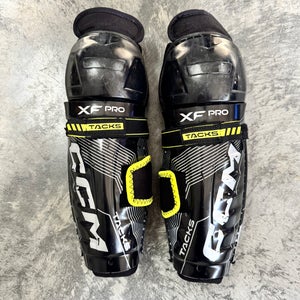 Junior CCM Tacks XF Pro 10" Shin Pads (Used)