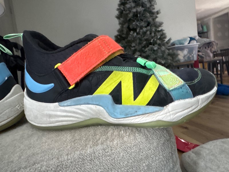 Black Kid's Size M 10.0 (W 11.0) Youth New Balance High Top Turf Cleats (Used)