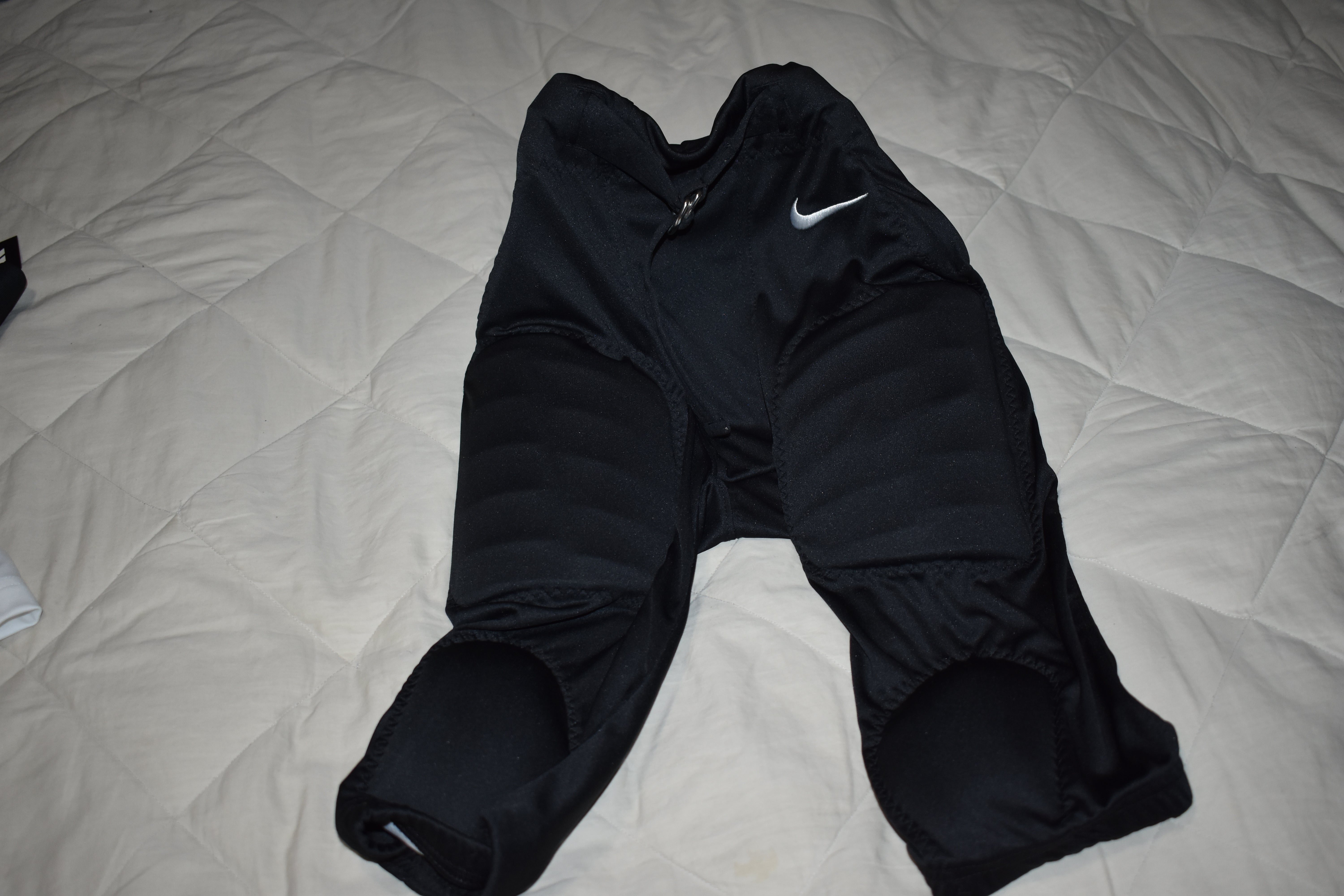 nike black youth football pants