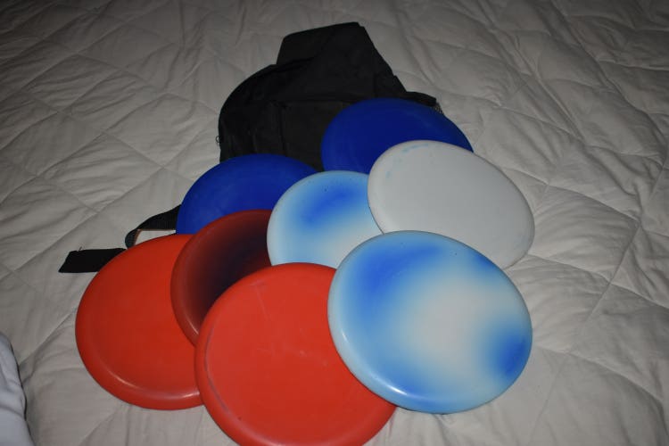 Assorted Discs and Backpack (8)