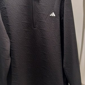 This is an Adidas DWR (Durable Water-Repellent) Quarter-Zip Golf Pullover in black.