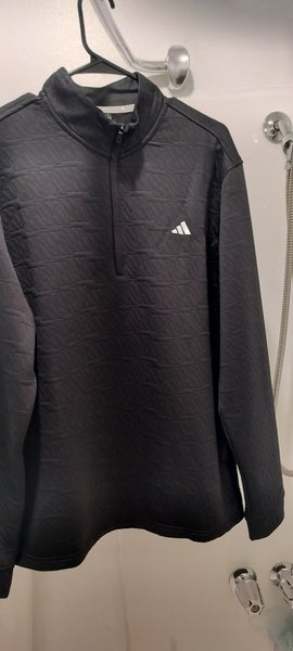 This is an Adidas DWR (Durable Water-Repellent) Quarter-Zip Golf Pullover in black.