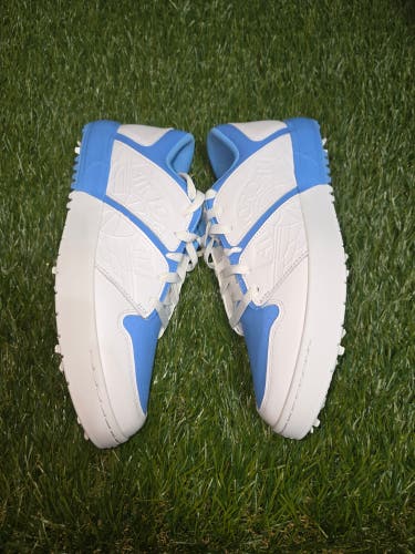Nike Jordan Nu Retro 1 G Golf Shoes in the White and University Blue colorway.