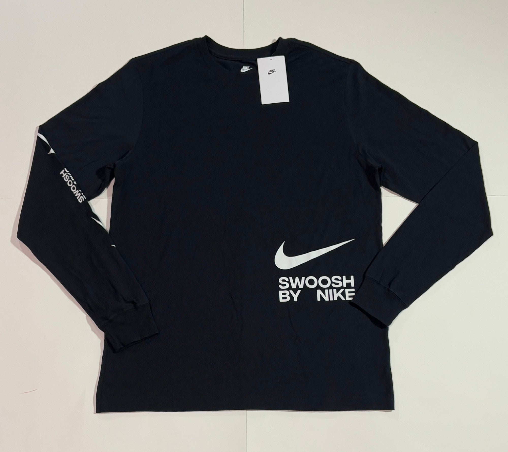 nike swoosh on sleeve