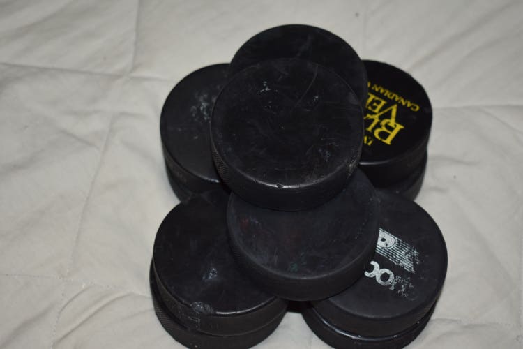 Hockey Pucks, Lot of 11