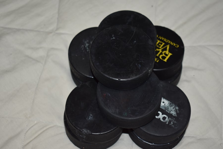 Hockey Pucks, Lot of 11
