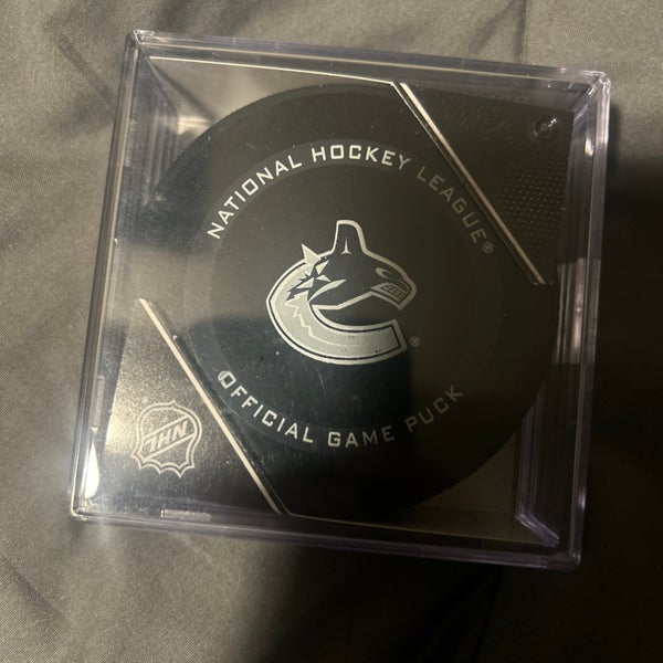 Game used hockey puck