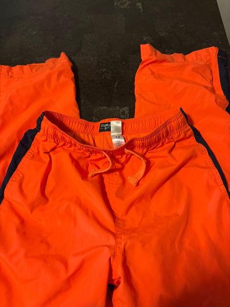 Osh Kosh B’Gosh Orange with navy stripe mesh lined track pants . Size 12 Boys Pants (Used)