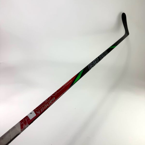Used Left Red/Green Bauer Nexus Tracer | 82 Flex P28 Curve Grip | F339