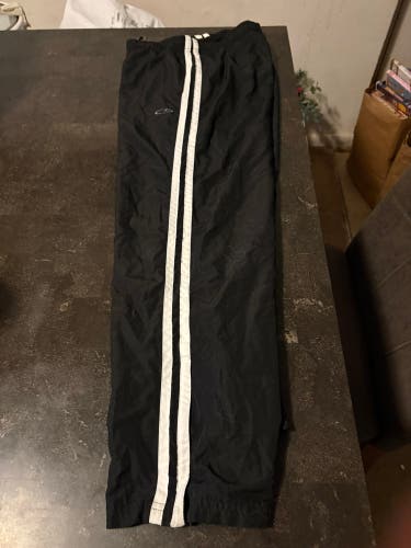 Champion - Black with white stripes athletic track pant .